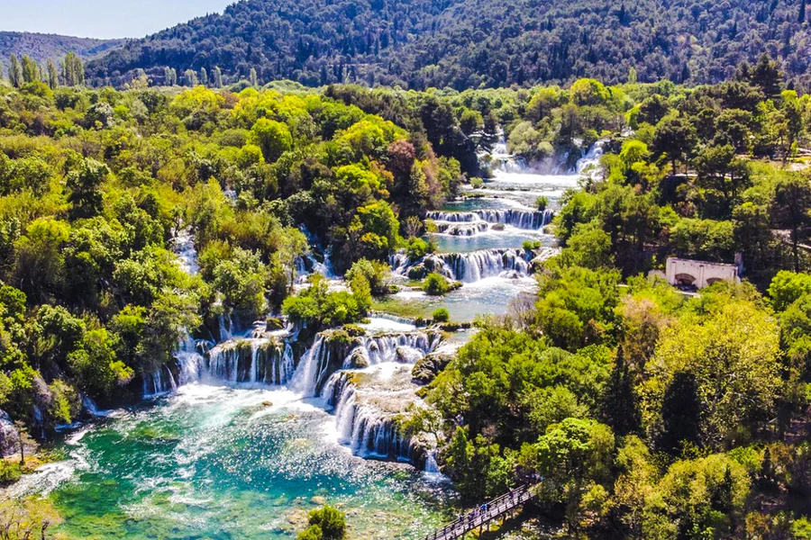 From Omiš: Krka National Park Guided Day Trip with Boat Ride and Swimming, Split
