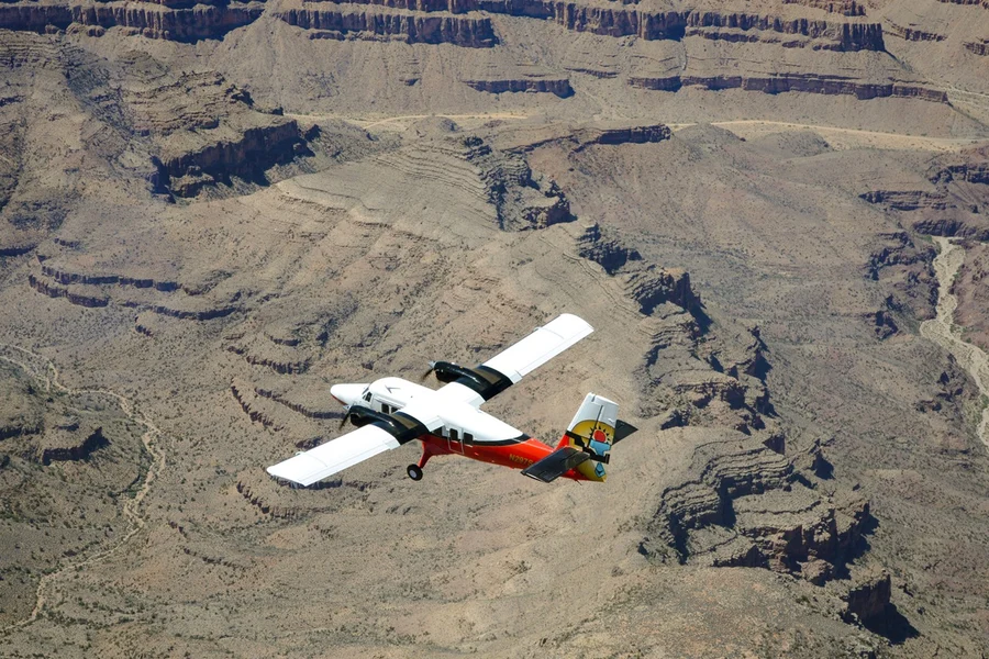 70- min Las Vegas to Grand Canyon West Airplane Tour with Helicopter Canyon Floor Landing & Pontoon Boat Ride, Las Vegas